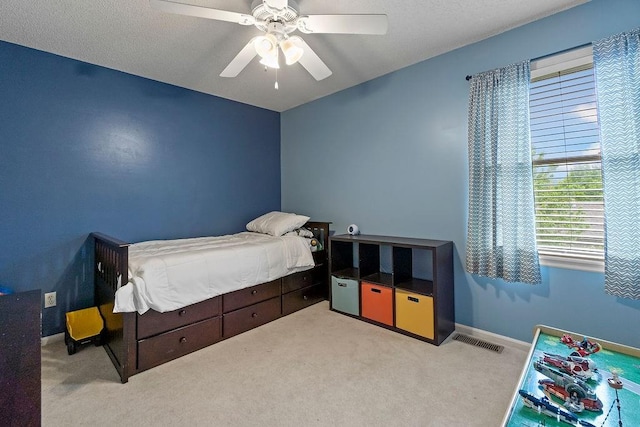 14263 W 129th Ter, Olathe, KS 66062 - carpeted bedroom featuring ceiling fan and baseboards