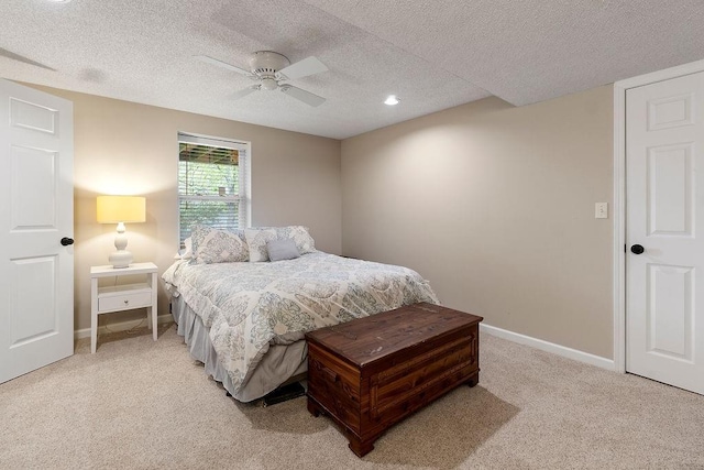 14263 W 129th Ter, Olathe, KS 66062 - bedroom with light colored carpet, a textured ceiling, a ceiling fan, and baseboards