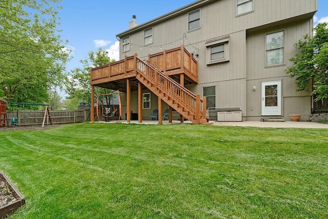 14263 W 129th Ter, Olathe, KS 66062 - back of house featuring a patio area, stairway, a wooden deck, and a chimney