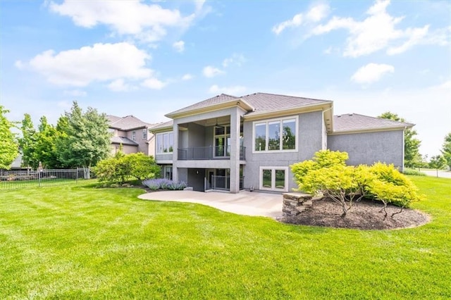 16456 Cody St, Overland Park, KS 66062 - back of house with a balcony, a patio, and stucco siding