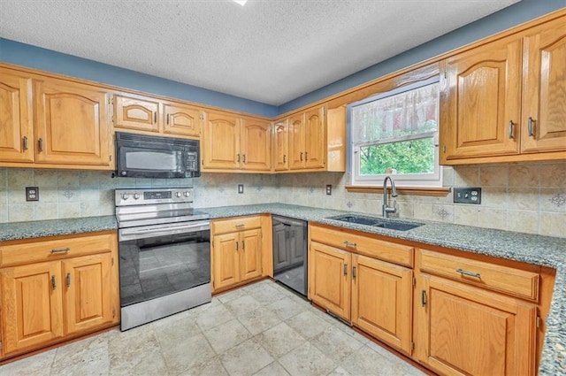 kitchen with black appliances, a sink, backsplash, a textured ceiling, and light stone countertops