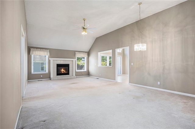 7001 W 157th Ter, Overland Park, KS 66223 - unfurnished living room featuring healthy amount of natural light, a ceiling fan, baseboards, and vaulted ceiling