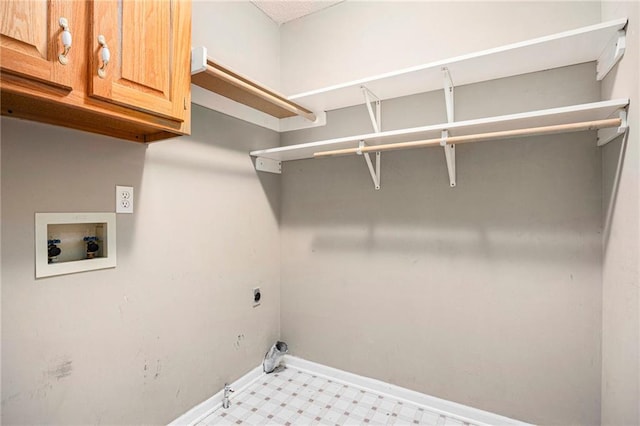 7001 W 157th Ter, Overland Park, KS 66223 - washroom with cabinet space, hookup for a washing machine, hookup for an electric dryer, baseboards, and light floors