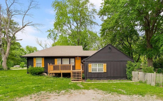 14213 S Haven Rd, Grandview, MO 64030 - bungalow with board and batten siding and a porch