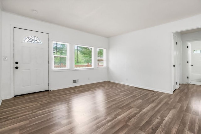 14213 S Haven Rd, Grandview, MO 64030 - entryway with wood finished floors and baseboards