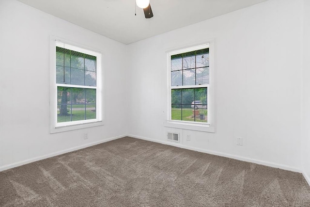 14213 S Haven Rd, Grandview, MO 64030 - carpeted spare room featuring ceiling fan and baseboards