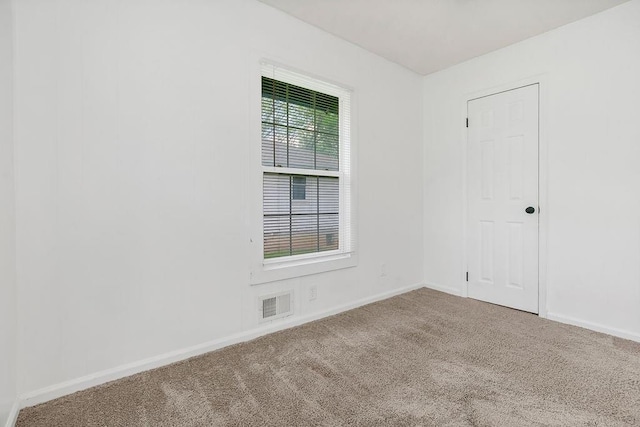 14213 S Haven Rd, Grandview, MO 64030 - unfurnished room with carpet flooring and baseboards