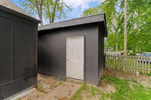 14213 S Haven Rd, Grandview, MO 64030 - view of shed featuring fence