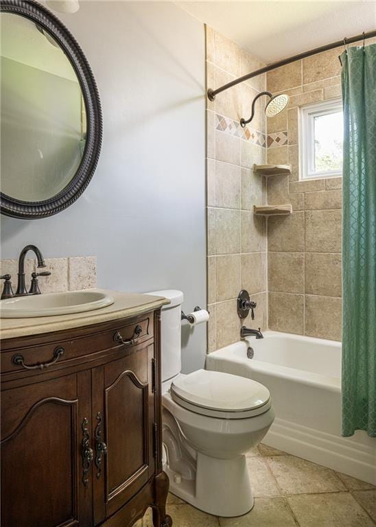 full bathroom featuring shower / tub combo, toilet, vanity, and tile patterned floors