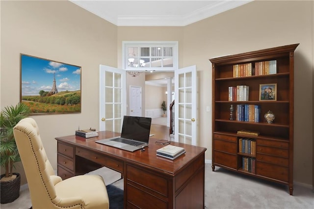 office space with french doors, light carpet, and ornamental molding