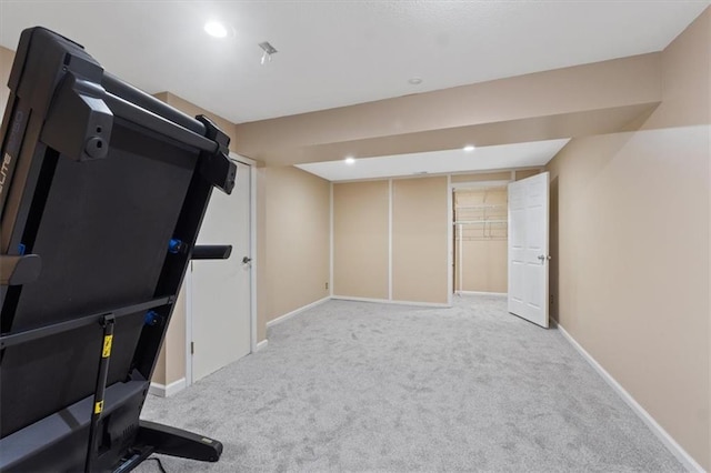 workout room featuring carpet flooring, baseboards, and recessed lighting