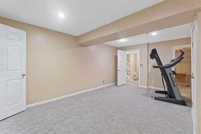 workout room featuring carpet floors, baseboards, and recessed lighting