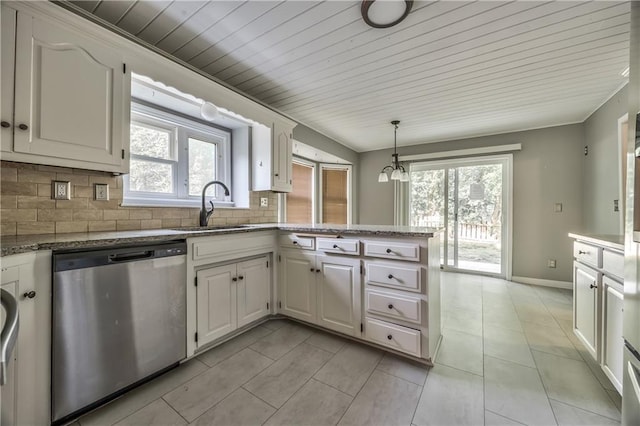 529 SW Windmill Ln, Lees Summit, MO 64082 - kitchen featuring dishwasher, a sink, decorative backsplash, light tile patterned flooring, and white cabinets