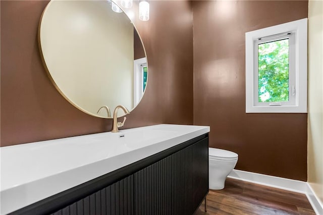 4505 W 126th St, Leawood, KS 66209 - bathroom with wood finished floors and vanity