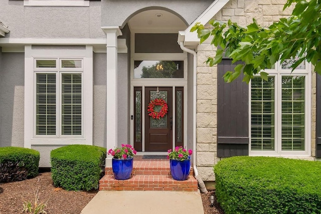 6104 W 144th St, Overland Park, KS 66223 - entrance to property with stucco siding and stone siding