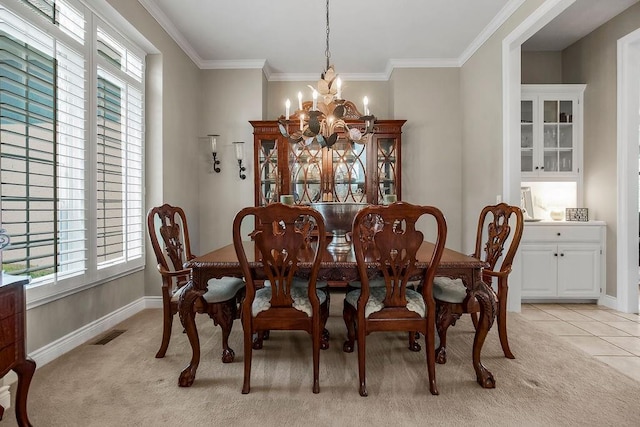 6104 W 144th St, Overland Park, KS 66223 - dining room with a chandelier, baseboards, light colored carpet, and ornamental molding