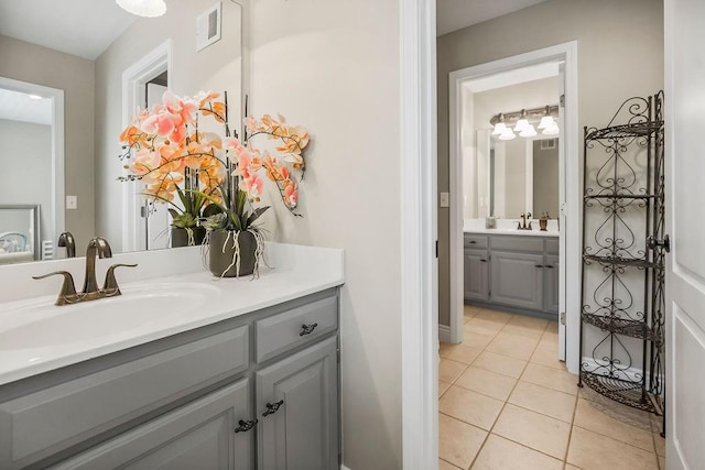 6104 W 144th St, Overland Park, KS 66223 - bathroom featuring vanity and tile patterned flooring