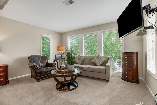 6104 W 144th St, Overland Park, KS 66223 - carpeted living area featuring baseboards