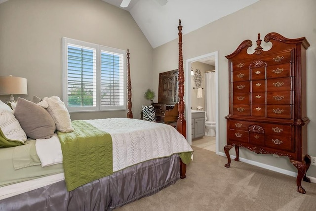 6104 W 144th St, Overland Park, KS 66223 - bedroom with lofted ceiling, light colored carpet, connected bathroom, ceiling fan, and baseboards