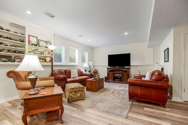 6104 W 144th St, Overland Park, KS 66223 - living room featuring light wood-type flooring and recessed lighting