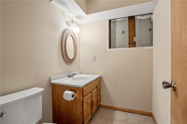 20129 W 112th Cir, Olathe, KS 66061 - bathroom with electric panel, toilet, vanity, and tile patterned floors