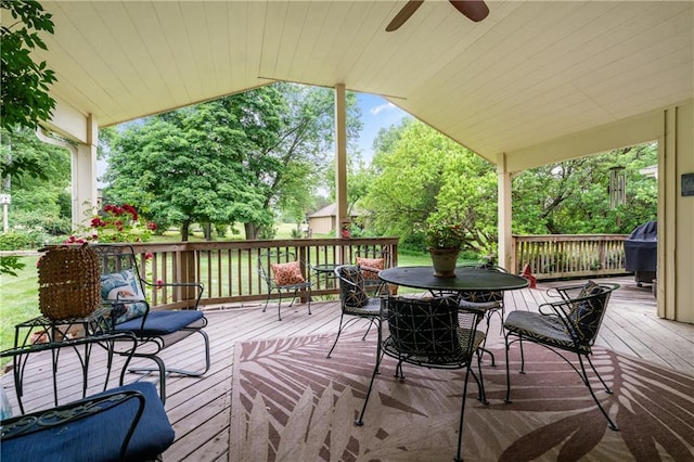 20129 W 112th Cir, Olathe, KS 66061 - wooden deck with a ceiling fan, outdoor dining space, and grilling area