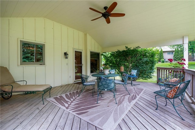 20129 W 112th Cir, Olathe, KS 66061 - deck with outdoor dining space and a ceiling fan