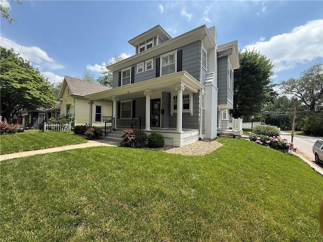 1701 Main St, Lexington, MO 64067 - traditional style home with covered porch and a front yard