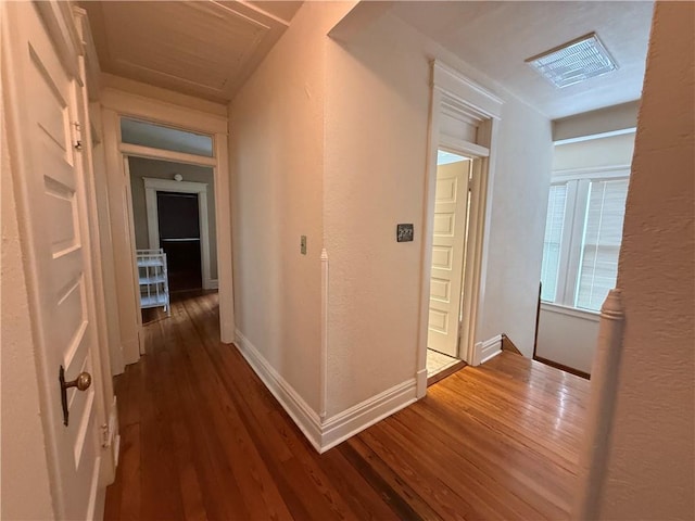 1701 Main St, Lexington, MO 64067 - hall with wood finished floors, a textured wall, and attic access