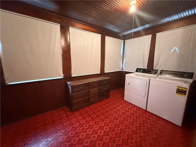 1701 Main St, Lexington, MO 64067 - laundry room with washer and dryer and wooden walls