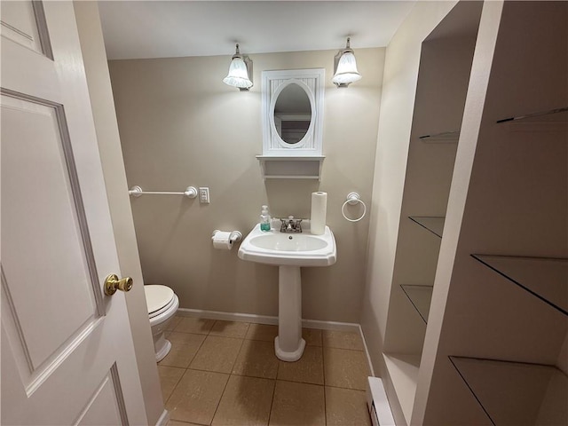 1701 Main St, Lexington, MO 64067 - bathroom with toilet and tile patterned floors
