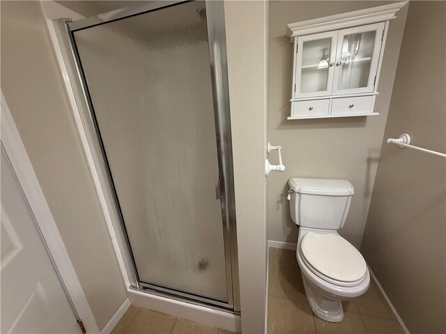 1701 Main St, Lexington, MO 64067 - full bathroom featuring a stall shower and tile patterned floors