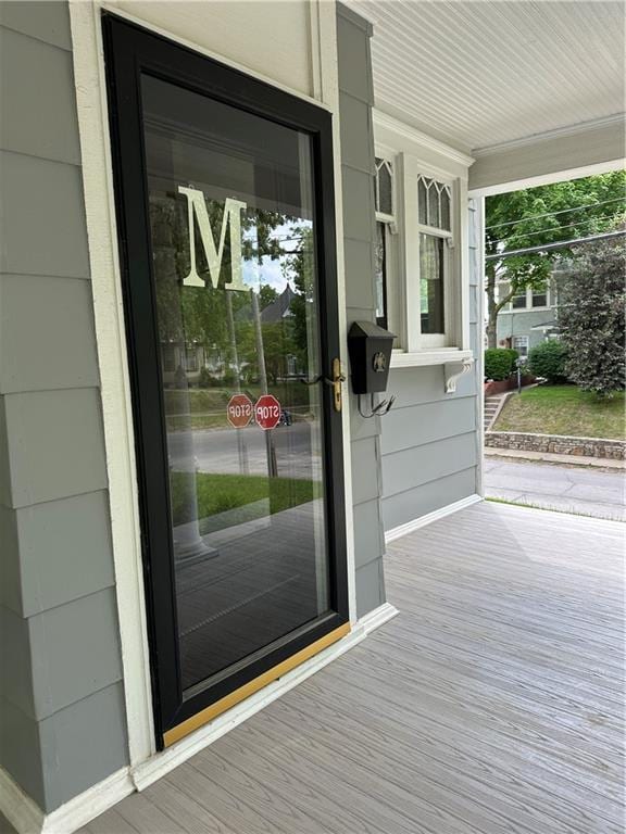 1701 Main St, Lexington, MO 64067 - doorway to property featuring covered porch