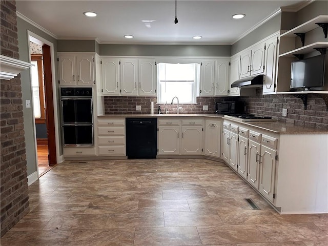 1701 Main St, Lexington, MO 64067 - kitchen featuring black appliances, under cabinet range hood, white cabinets, tasteful backsplash, and ornamental molding