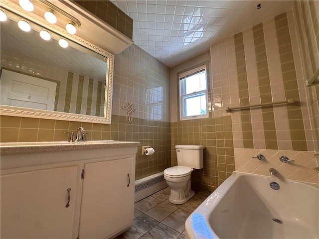 1701 Main St, Lexington, MO 64067 - full bathroom featuring tile walls, a tub, baseboard heating, and vanity