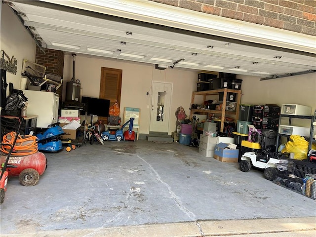 509 Pearl St, Pittsburg, KS 66762 - garage featuring a garage door opener