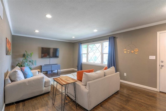 living room featuring a textured ceiling, wood finished floors, ornamental molding, recessed lighting, and baseboards
