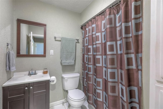 full bath featuring toilet, a textured wall, a textured ceiling, vanity, and baseboards
