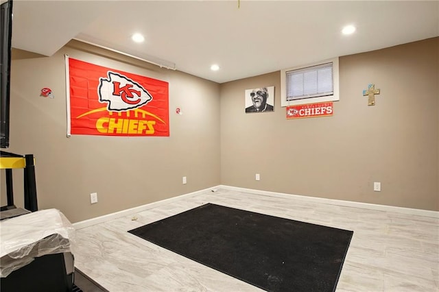 interior space with recessed lighting and baseboards