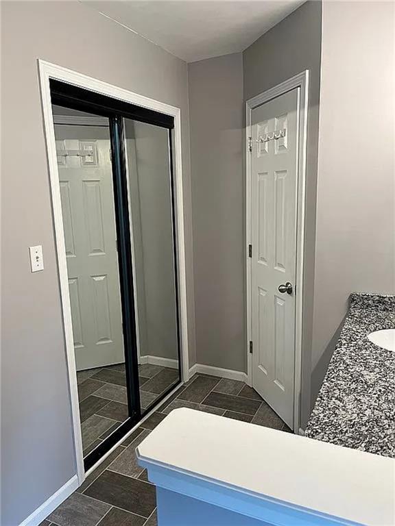 bathroom featuring baseboards