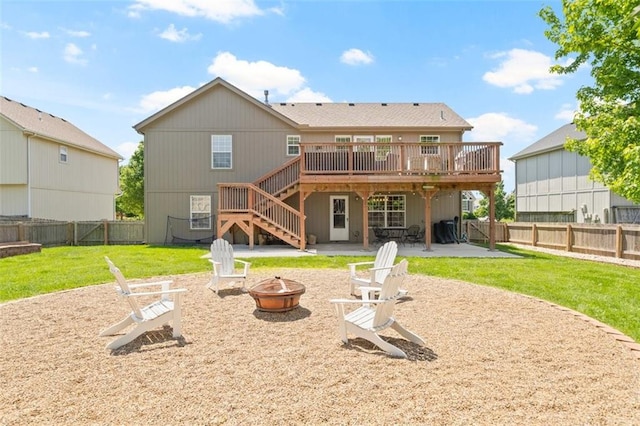back of house with an outdoor fire pit, stairway, a patio area, and a deck