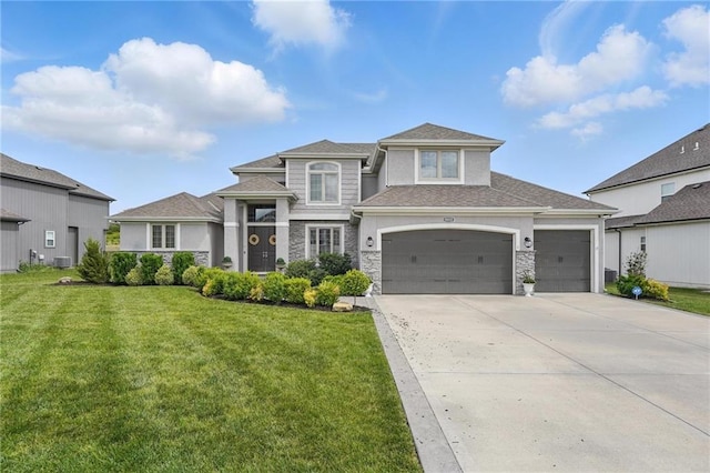 8833 N Crescent Ave, Kansas City, MO 64157 - prairie-style house with stone siding, driveway, a front yard, and an attached garage