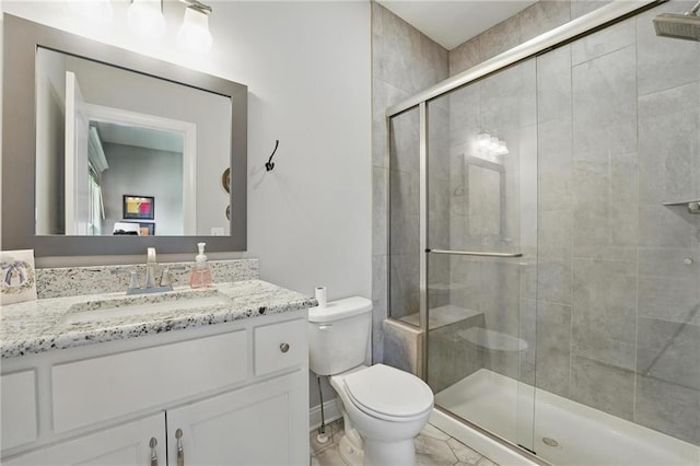 8833 N Crescent Ave, Kansas City, MO 64157 - bathroom featuring toilet, vanity, and a stall shower