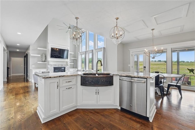 8833 N Crescent Ave, Kansas City, MO 64157 - kitchen featuring stainless steel dishwasher, a sink, a chandelier, healthy amount of natural light, and recessed lighting