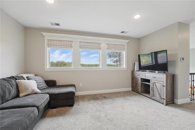 8833 N Crescent Ave, Kansas City, MO 64157 - living room with plenty of natural light, baseboards, light carpet, and recessed lighting