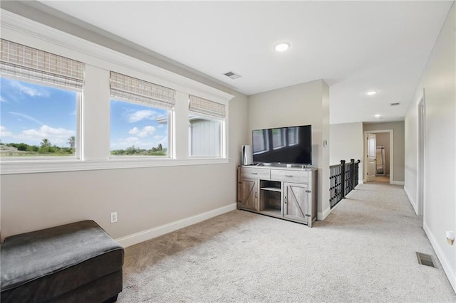 8833 N Crescent Ave, Kansas City, MO 64157 - unfurnished room featuring light colored carpet, baseboards, plenty of natural light, and recessed lighting