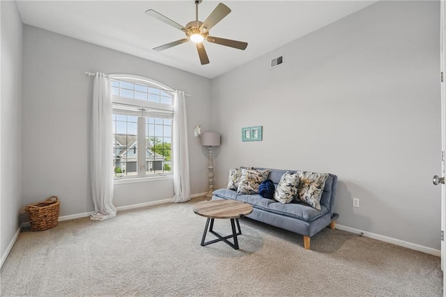 8833 N Crescent Ave, Kansas City, MO 64157 - sitting room with ceiling fan, carpet floors, and baseboards
