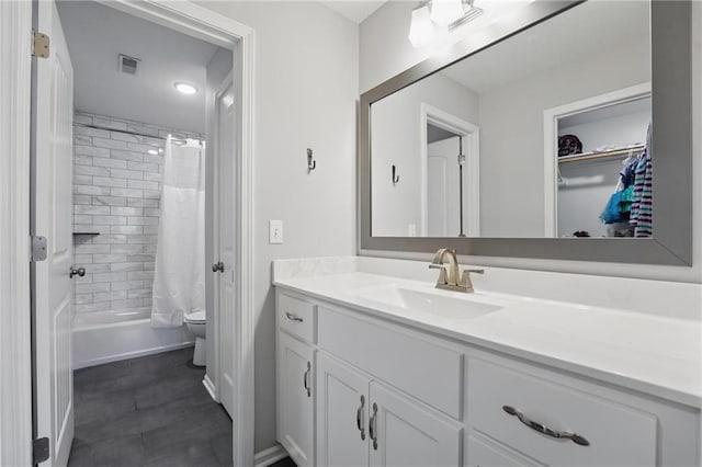 8833 N Crescent Ave, Kansas City, MO 64157 - full bath featuring vanity, toilet, shower / tub combo, and a spacious closet