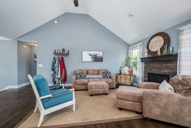 2251 Valley View Dr, Tonganoxie, KS 66086 - living room with wood finished floors, a fireplace, high vaulted ceiling, baseboards, and a ceiling fan
