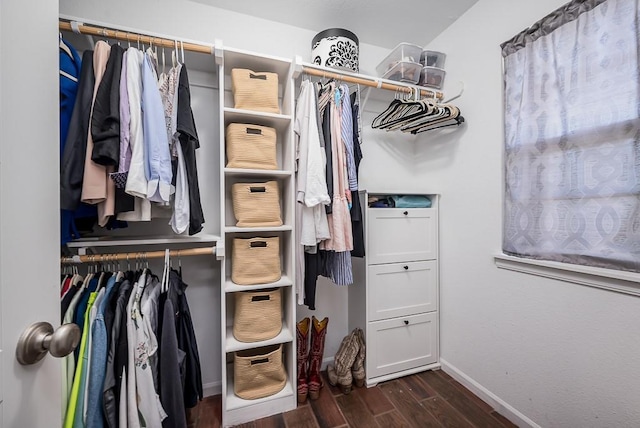 2251 Valley View Dr, Tonganoxie, KS 66086 - walk in closet with dark wood-type flooring